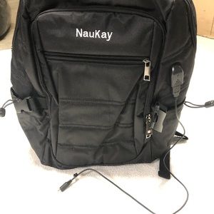 NauKay laptop charging backpack w multiple pockets